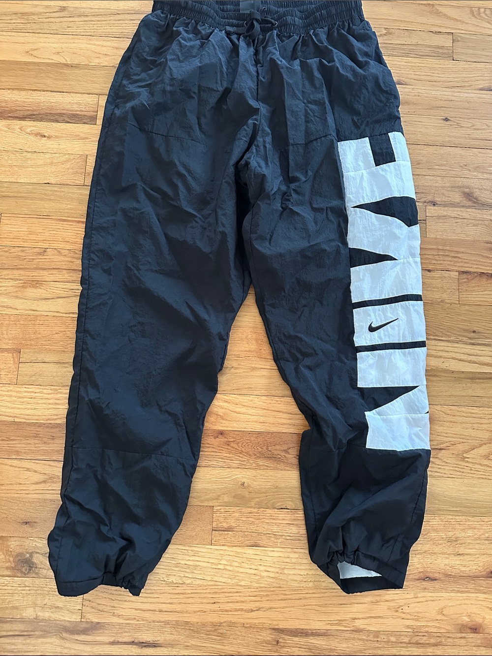 Nike Men’s Black Windbreaker Jogger Pants with White Side Logo Panel